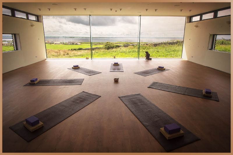Yoga class room with a relaxed atmosphere with yoga mats and natural lights